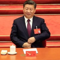 China’s Communist Party Inserts President Xi Jinping’s Name Into Party Constitution