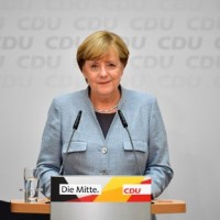 Merkel Confirms Ready To Govern With Liberals And Greens