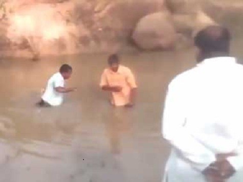 Dalitmen Threatened To Dare Enter A Pond By Uppercaste Man Weilding Stick In Telangana