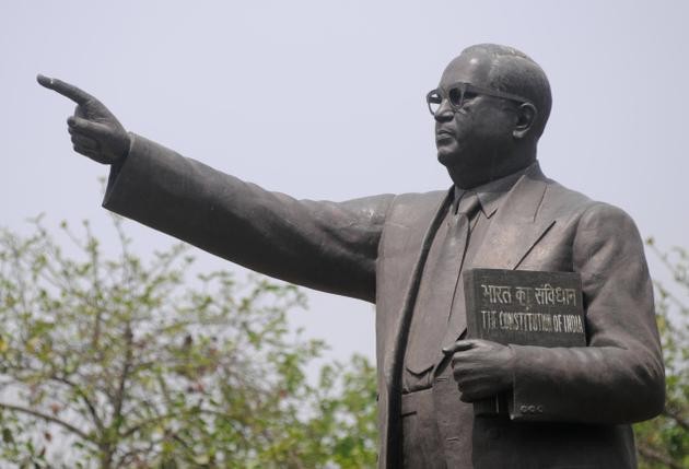 BJP MLA stirs row after she washes Ambedkar statue with milk, covers it with saffron-coloured cloth BJP MLA stirs row after she washes Ambedkar statue with milk, covers it with saffron-coloured cloth