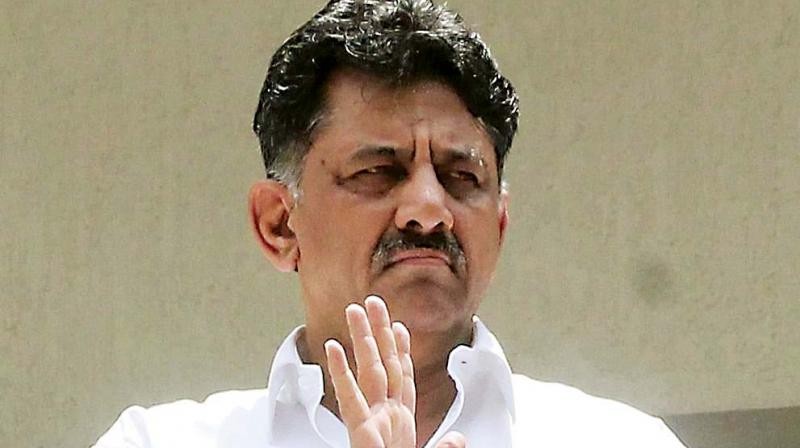Police escort DK Shivakumar out of Mumbai hotel where ten rebel MLAs are staying Police escort DK Shivakumar out of Mumbai hotel where ten rebel MLAs are staying