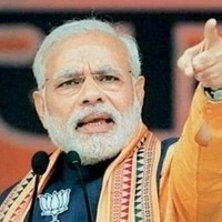 Modi plugs regularisation of colonies at Ramlila rally