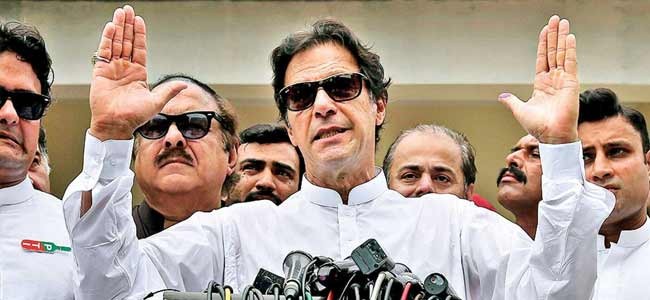Facing empty coffers, Imran Khan calls for new law to deal with money laundering