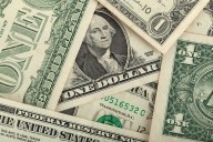 Dollar rises amid economic data