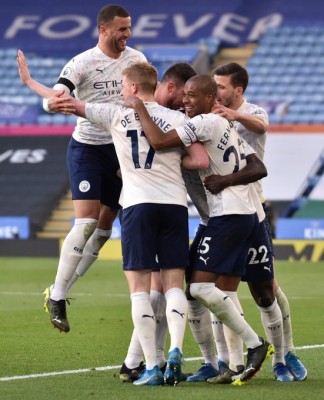 City continue cruise, Liverpool beat Arsenal 3-0 City continue cruise, Liverpool beat Arsenal 3-0