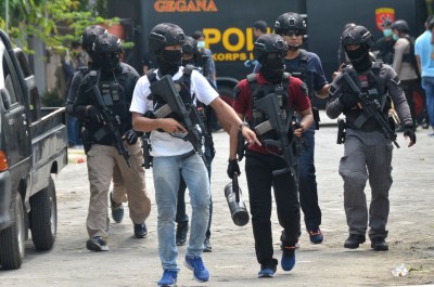 Indonesian police kills suspect linked to church attack Indonesian police kills suspect linked to church attack