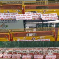 Hindu Sena activists put up posters outside Cong HQ