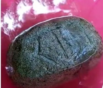 Stone with 'Ram' inscribed on it found floating in UP river