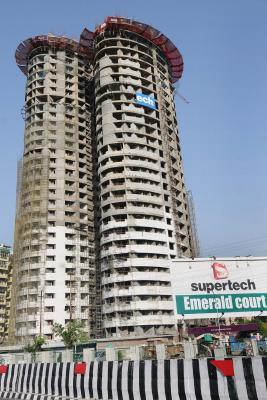 Supertech's 40-storey twin towers in Noida to be razed, SC cites builder-authority collusion Supertech's 40-storey twin towers in Noida to be razed, SC cites builder-authority collusion