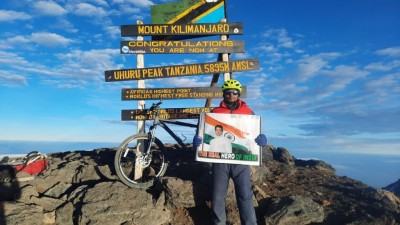Cyclist reaches top of Kilimanjaro, unveils Sonu Sood poster Cyclist reaches top of Kilimanjaro, unveils Sonu Sood poster