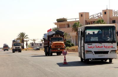 Armed men start leaving Syria's Daraa under new deal Armed men start leaving Syria's Daraa under new deal