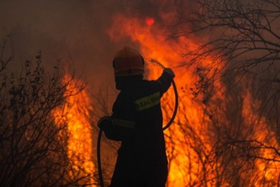 One dead, over 40 injured in wildfires near Athens One dead, over 40 injured in wildfires near Athens