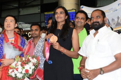 Double Olympic medalist Sindhu arrives in Hyd to rousing welcome Double Olympic medalist Sindhu arrives in Hyd to rousing welcome
