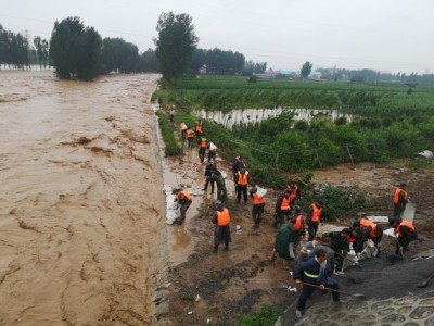 Death toll from floods in China's Henan reach 302 Death toll from floods in China's Henan reach 302