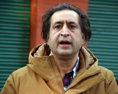 Sajad Lone pays tribute to 2 cops killed by terrorists Sajad Lone pays tribute to 2 cops killed by terrorists