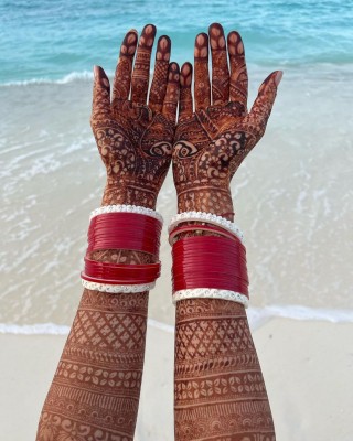 Katrina shares glimpse of beachy honeymoon, shows mehendi-adorned hands