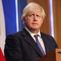 UK PM warns of 'Omicron tidal wave', sets new booster target