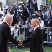 US warns Russia of large-scale sanctions over Ukraine, Putin tells Biden it will be a 'grave mistake'