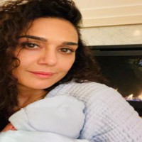 Preity Zinta is loving 'burp cloths, diapers and babies'