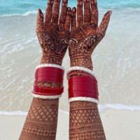 Katrina shares glimpse of beachy honeymoon, shows mehendi-adorned hands