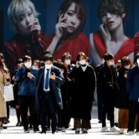 Japanese household assets mark record high on less spending