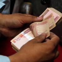 Value of Afghanistan's currency climbs against dollar