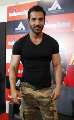John Abraham : Working in action films is like doing an item song for me John Abraham : Working in action films is like doing an item song for me