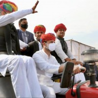 Rahul Gandhi drives to tractor rally in Rajasthan
