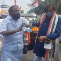 Tharoor's auto rickshaw protest against fuel price hike