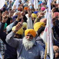 End agitation, hold talks: Modi to farmers