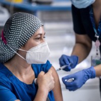 Chile vaccinates nearly 2.4mn people against Covid-19