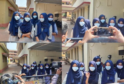 K'taka hijab row: Students defying govt order sent out of classrooms K'taka hijab row: Students defying govt order sent out of classrooms
