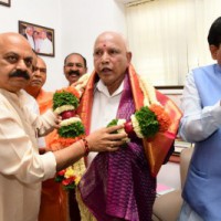 Seeking Yediyurappa's guidance to retain power: K'taka CM Bommai