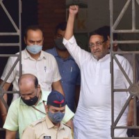 A day after Nawab Malik's arrest, MVA & BJP protest against each other