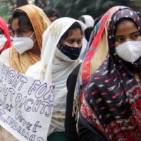 Right wing activists detained for protesting against girls wearing burqa at Surat school