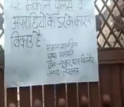 House for sale poster claims 'harassment' by police House for sale poster claims 'harassment' by police