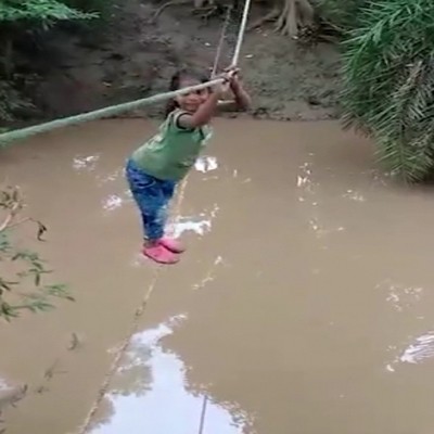 Students forced to reach school in MP dist by crossing river on ropes Students forced to reach school in MP dist by crossing river on ropes