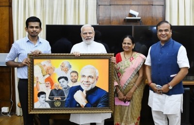 Assam's physically-challenged artist gifts painting to PM Modi Assam's physically-challenged artist gifts painting to PM Modi