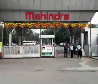 M&M to hive off EV car business, ropes in BII as equity partner M&M to hive off EV car business, ropes in BII as equity partner