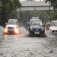 Delhi: Heavy rain affects normal life; traffic snarls at several places