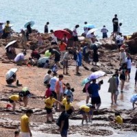 China renews alert for high temperatures