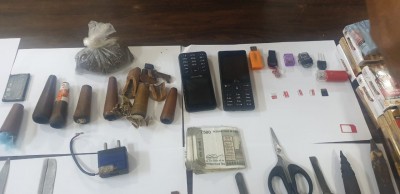 Arms, ganja & phones recovered from B'luru central jail Arms, ganja & phones recovered from B'luru central jail