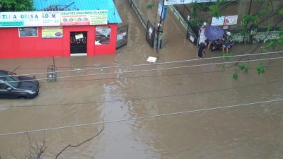 Torrential rains clobber Mumbai, paralyse traffic, trains