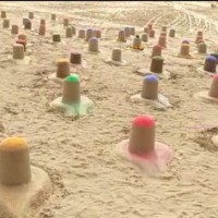 Sand artist creates 108 colourful Shiva lingams in Pushkar