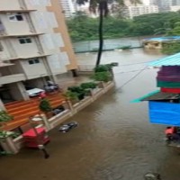 Heavy rains pound Mumbai, local trains hit