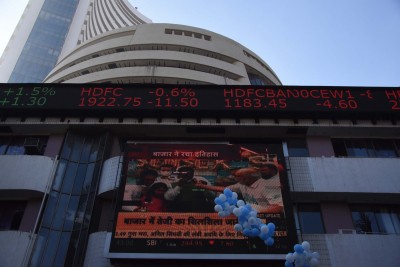 Sensex, Nifty end near record closing highs