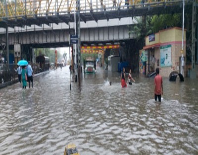 First day of monsoon, Mumbai on its knees as trains, traffic hit First day of monsoon, Mumbai on its knees as trains, traffic hit