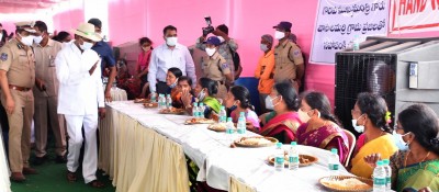 Telangana CM lunches with residents of adopted village Telangana CM lunches with residents of adopted village