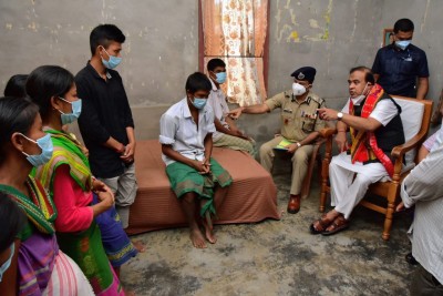 Assam CM visits family of two sisters found hanging from tree, assures stern action Assam CM visits family of two sisters found hanging from tree, assures stern action