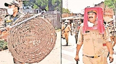 DGP orders probe as cops use chair, basket as riot gear DGP orders probe as cops use chair, basket as riot gear